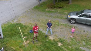 The author with cameraman Mercurio and assistant Samantha flying a mission to get aerial photographs of house for sale.